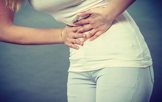 treatment for stomach pain by Riverdale Chiropractor Dr. Doug Gregory, Statera Chiropractic